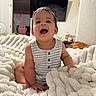 Luka joined the competition — help win amazing prizes! baby, child, smiling, blanket, indoor, television, furniture, home, person, cute, happy, infant, sitting, clothing, face, expression, room, cozy, texture, soft