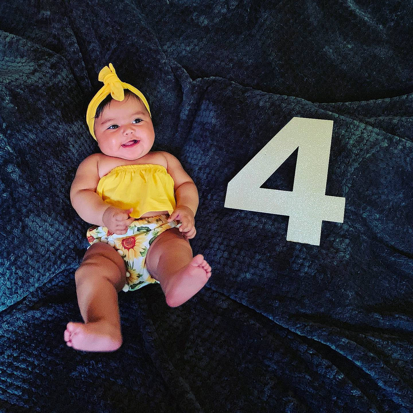 Kassandra joined the competition — help win amazing prizes! baby, baby_toddler_clothing, child, costume, costume_accessory, fun, person, smile, toddler, yellow