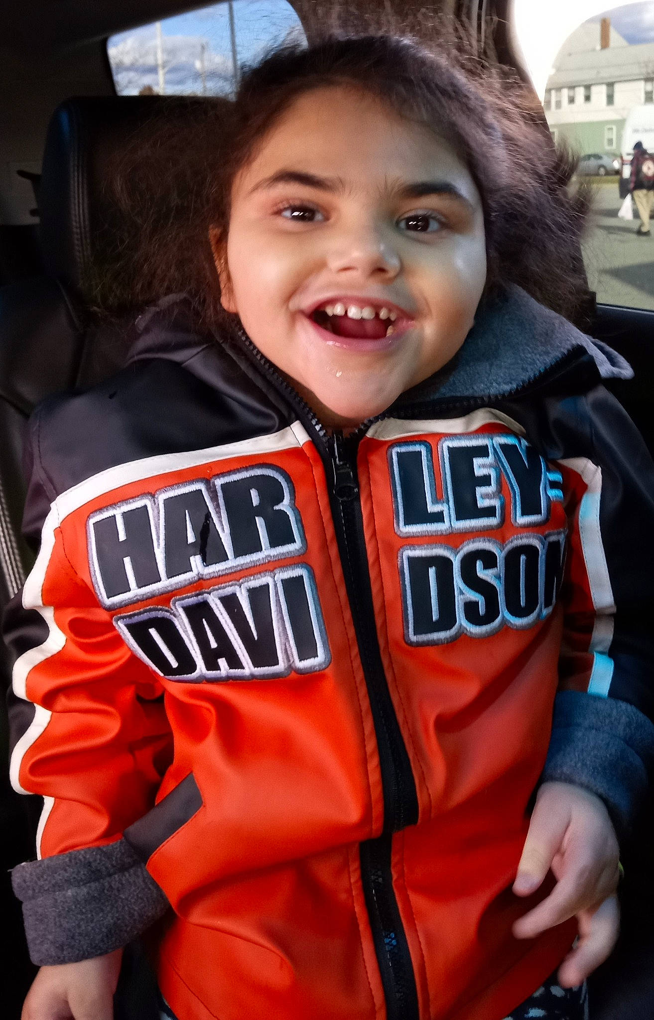 Lacey is registered to the contest to win money with this photo: carmine, cool, fun, gesture, hair, happy, head, jersey, joy, person, personal_protective_equipment, player, product, sleeve, smile, sports_gear, sports_uniform, sportswear, t_shirt, textile