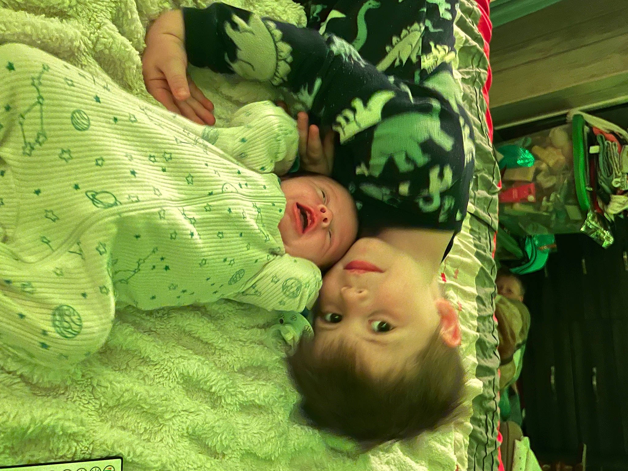 Abel is registered to the contest to win money with this photo: adaptation, baby, baby_toddler_clothing, bed, bedding, bedtime, child, comfort, couch, event, facial_expression, grass, green, happy, leaf, linens, pattern, person, room, skin