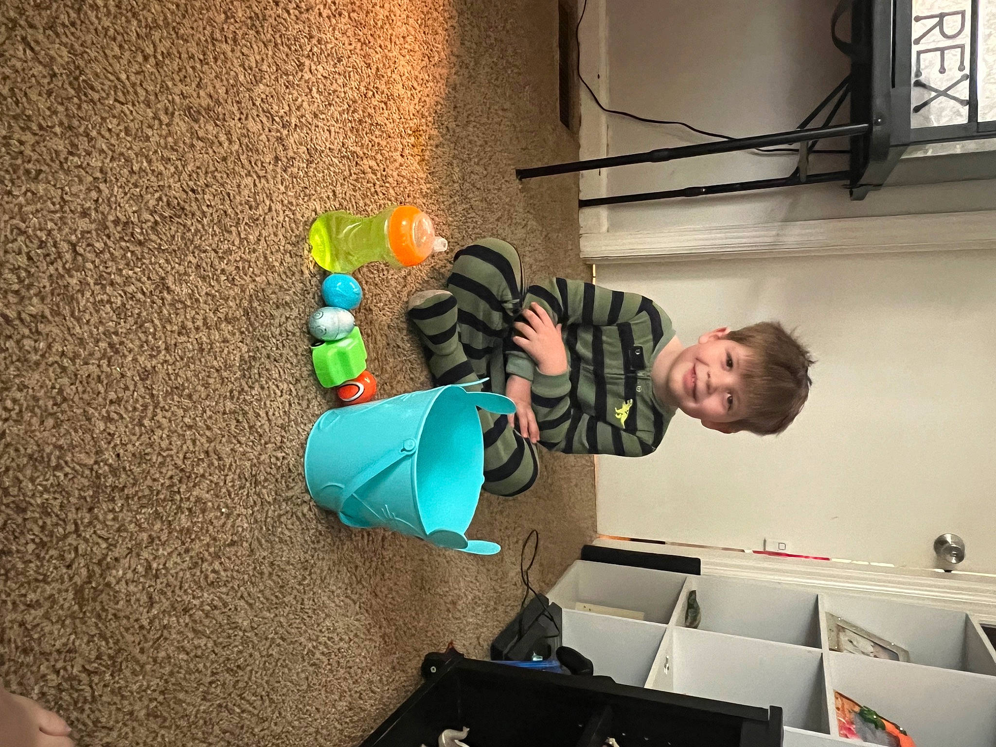 Abel is registered to the contest to win money with this photo: art, box, child, event, flooring, fun, gesture, job, joy, machine, person, plaster, room, shipping_box, space, t_shirt, visual_arts