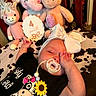 Brinley joined the competition — help win amazing prizes! baby, black_clothing, blanket, bow, child, cow_print, crib, cute, elephant_plush, horse_plush, indoor, infant, milestone, pacifier, pink, sign, sleeping, stuffed_animals, toy, unicorn_plush