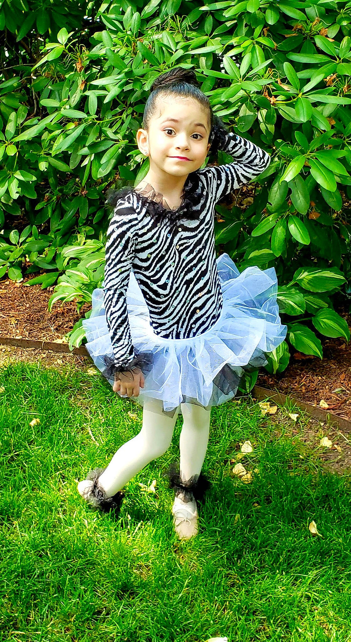 Isabella joined the competition — help win amazing prizes! baby_toddler_clothing, child, day_dress, eye, face, flash_photography, formal_wear, gesture, grass, happy, human_leg, joy, one_piece_garment, pattern, people_in_nature, person, plant, shoulder, sitting, sleeve