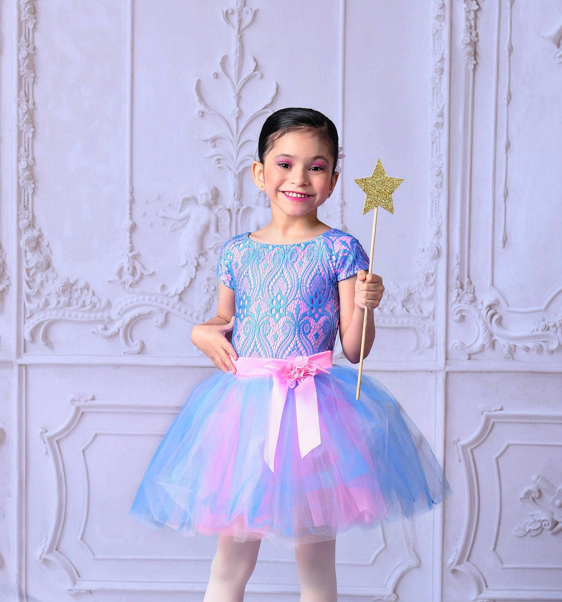 Isabella is registered to the contest to win money with this photo: baby_toddler_clothing, day_dress, dress, electric_blue, embellishment, fashion_design, formal_wear, happy, joy, magenta, neck, one_piece_garment, pattern, person, pink, purple, sleeve, smile, textile, toddler