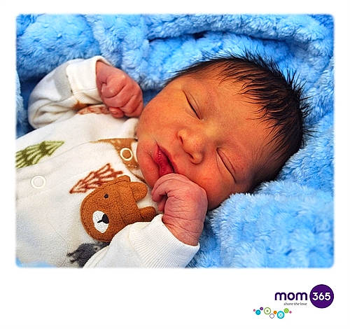 Cannon is registered to the contest to win money with this photo: baby, baby_products, baby_sleeping, baby_toddler_clothing, bedding, bedtime, cheek, child, comfort, font, happy, linens, nap, nose, person, product, skin, sleeve, smile, textile