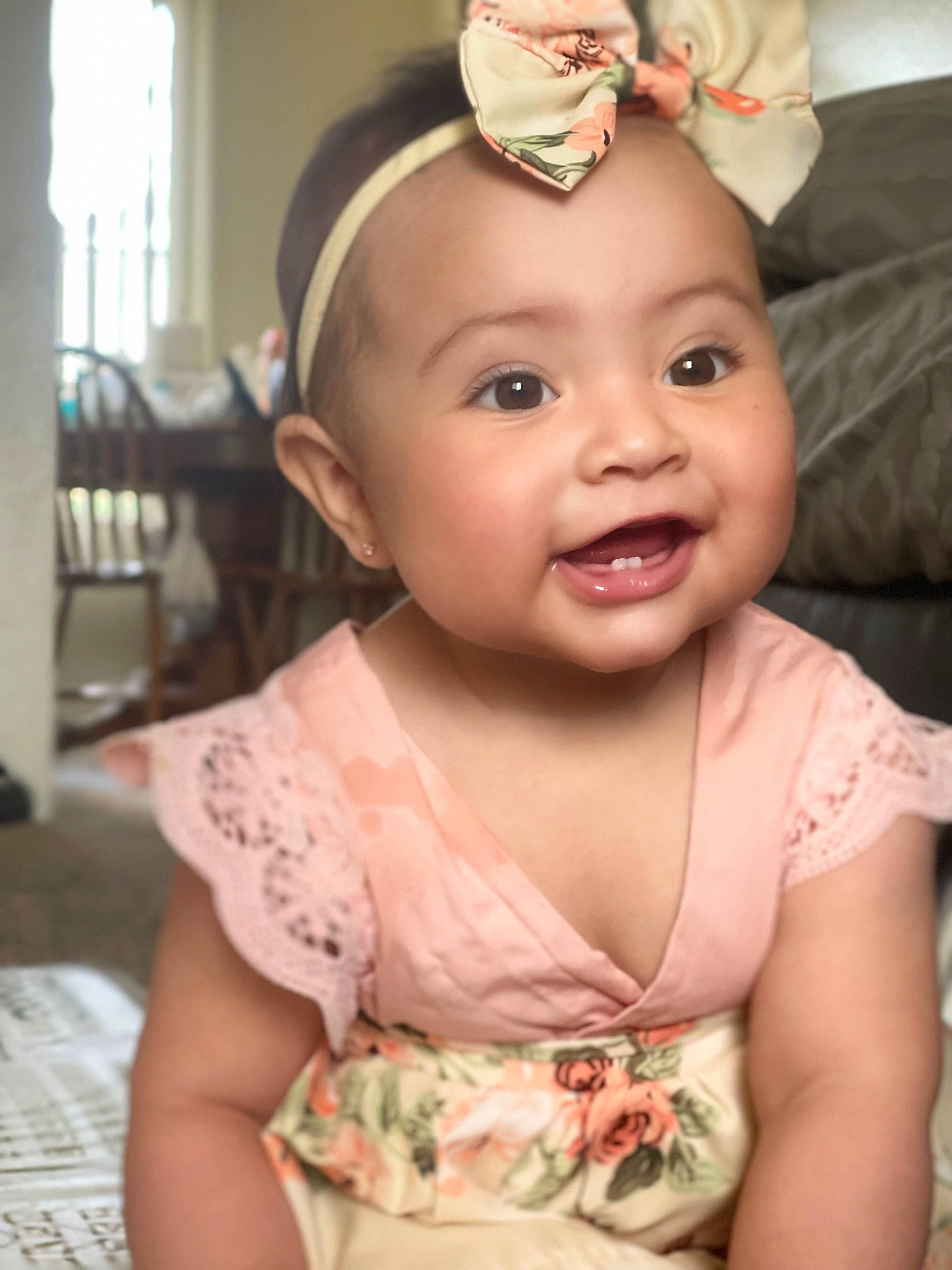 Daniella is registered to the contest to win money with this photo: baby, baby_toddler_clothing, cap, cheek, child, chin, dress, eye, eyelash, happy, headband, headpiece, iris, jewellery, lip, person, pink, skin, smile, tiara