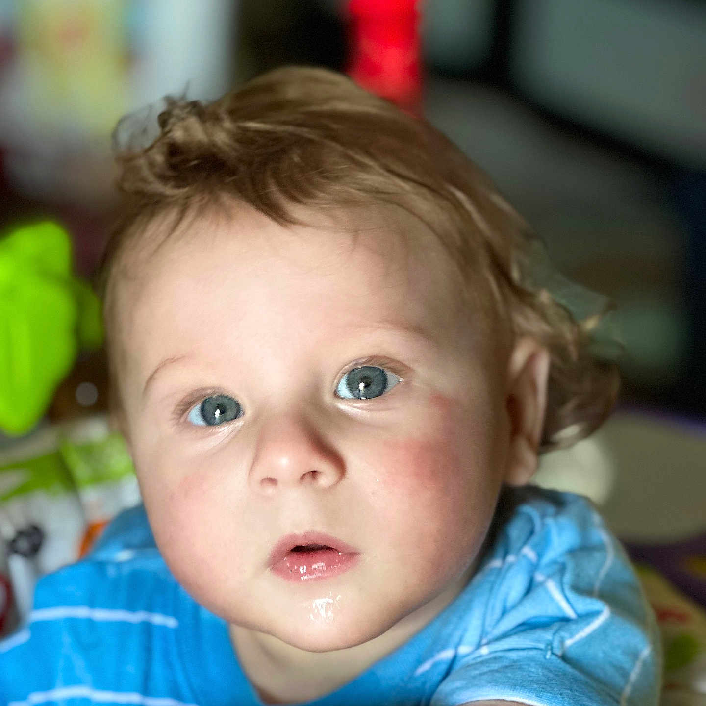 Everett is registered to the contest to win money with this photo: accessories, baby, blonde, bodypart, clothing, face, finger, hair, hand, happy, head, mouth, newborn, person, photography, portrait, selfie, sitting, smile, t_shirt