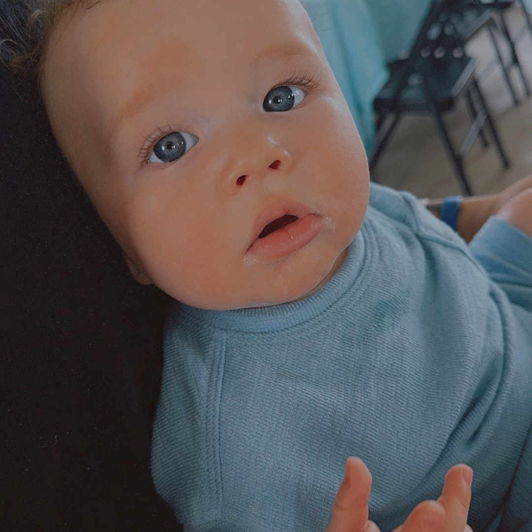 Koen joined the competition — help win amazing prizes! baby, bodypart, couch, cushion, face, finger, frown, furniture, hand, happy, head, homedecor, newborn, person, photography, portrait, sad, sitting, smile, wrist