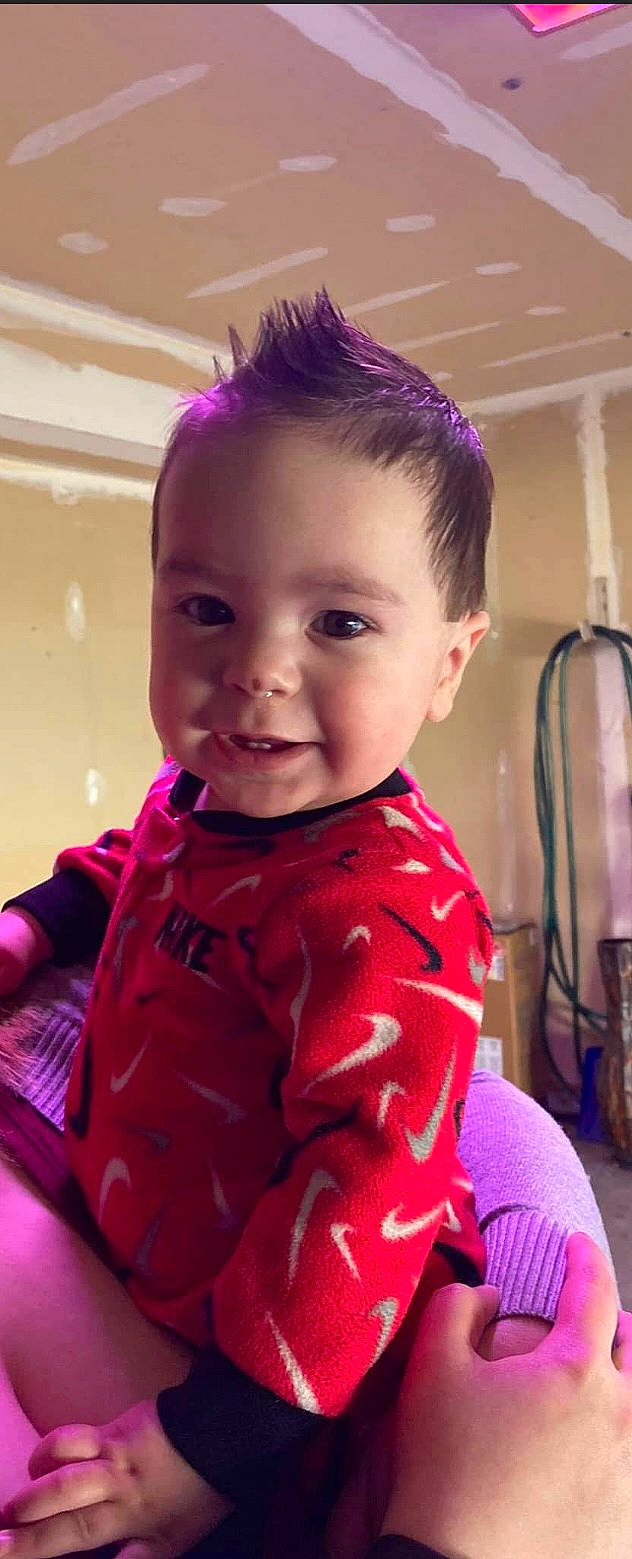 Edwin is registered to the contest to win money with this photo: baby_toddler_clothing, cool, dress, electric_blue, eyebrow, eyelash, facial_expression, hairstyle, happy, iris, lip, magenta, mouth, neck, person, pink, purple, skin, sleeve, smile