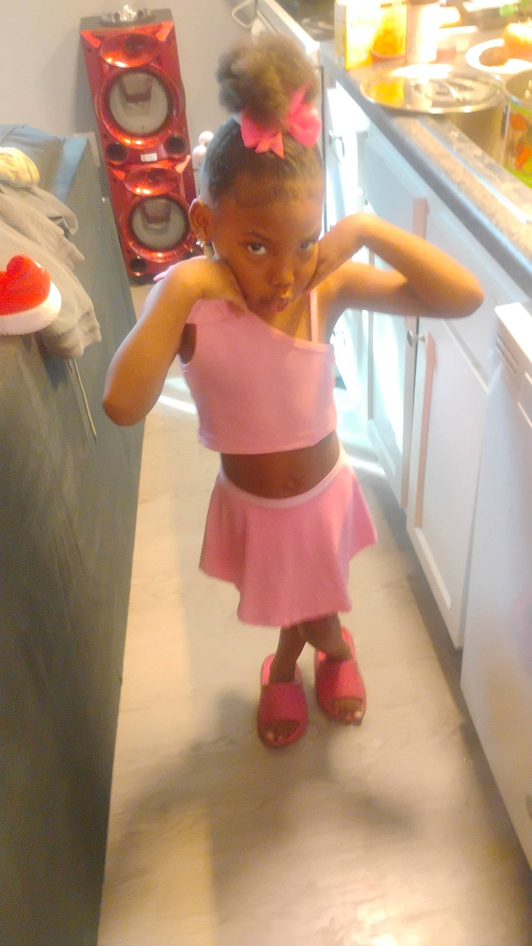 Bles'Synn is registered to the contest to win money with this photo: child, closet, clothing, cupboard, dress, face, female, footwear, furniture, girl, head, indoors, kitchen, person, photography, portrait, sandal, shoe, skirt, wood