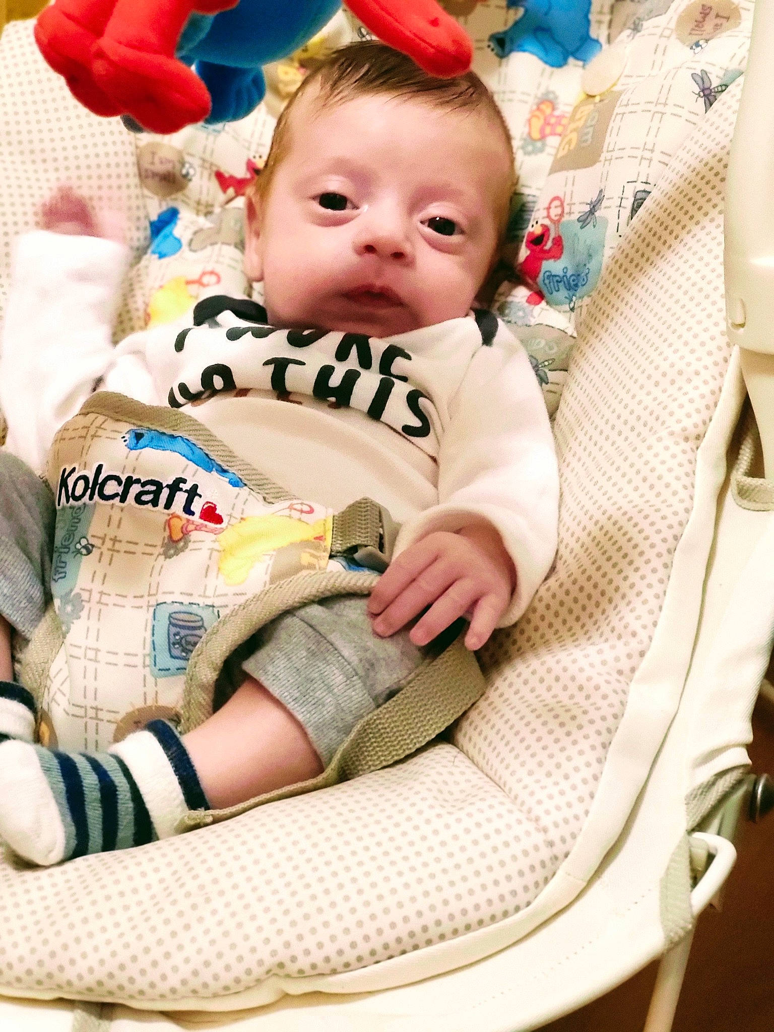 Leander is registered to the contest to win money with this photo: baby, baby_products, baby_safety, baby_toddler_clothing, carmine, chair, cheek, child, comfort, event, fun, happy, linens, pattern, person, room, sitting, toddler