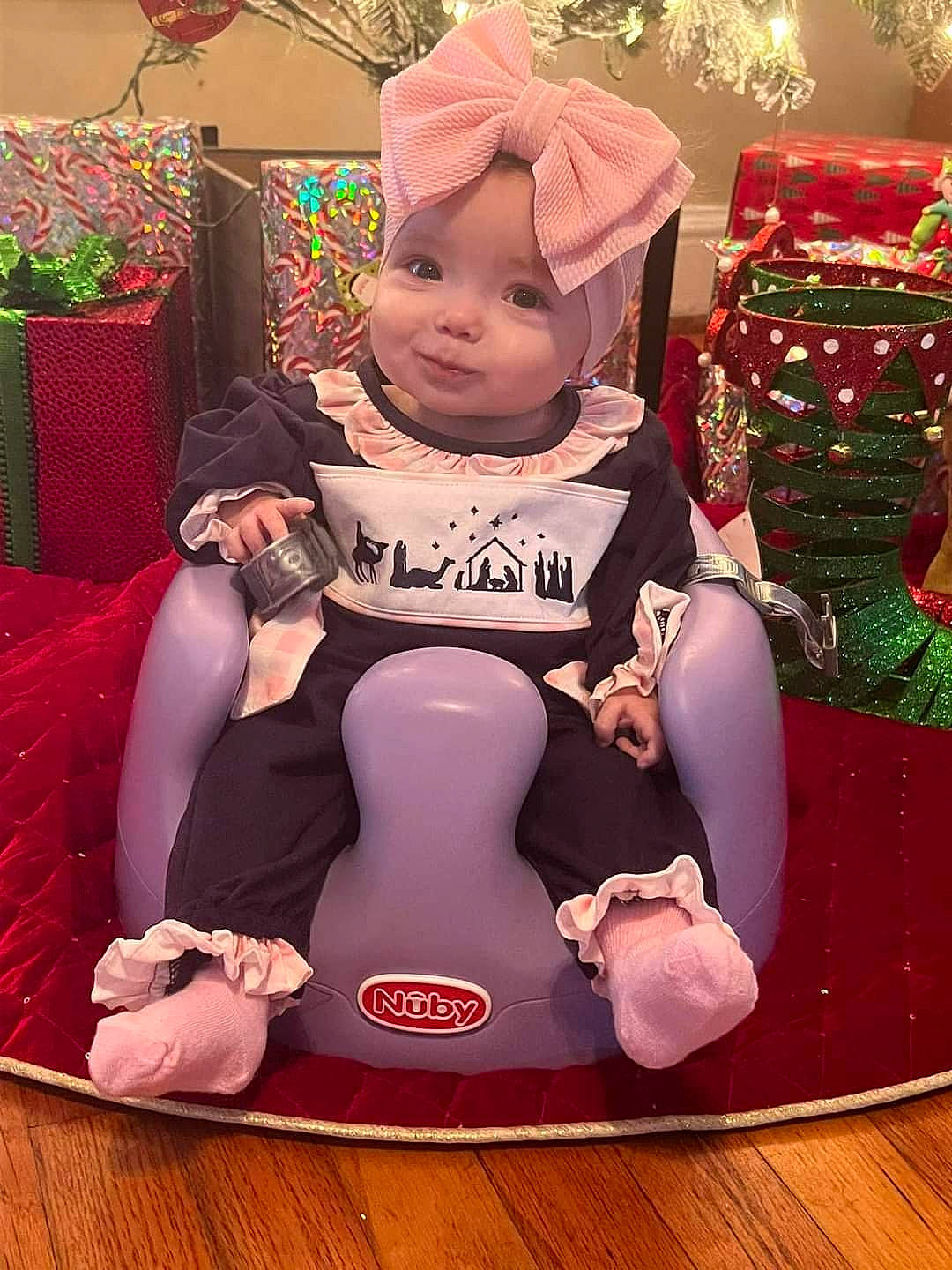 Lakelyn is registered to the contest to win money with this photo: baby, baby_products, baby_toddler_clothing, carmine, child, comfort, event, fun, happy, headwear, lap, leisure, magenta, person, pink, play, recreation, sitting, smile, thigh