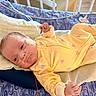 Eloise is registered to the contest to win money with this photo: baby, bed, blanket, crib, cute, healthcare, indoors, infant, lying_down, medical_equipment, nasal_tube, newborn, person, pillow, resting, sleepwear, small_hands, soft_lighting, watermelon_pattern, yellow_onesie