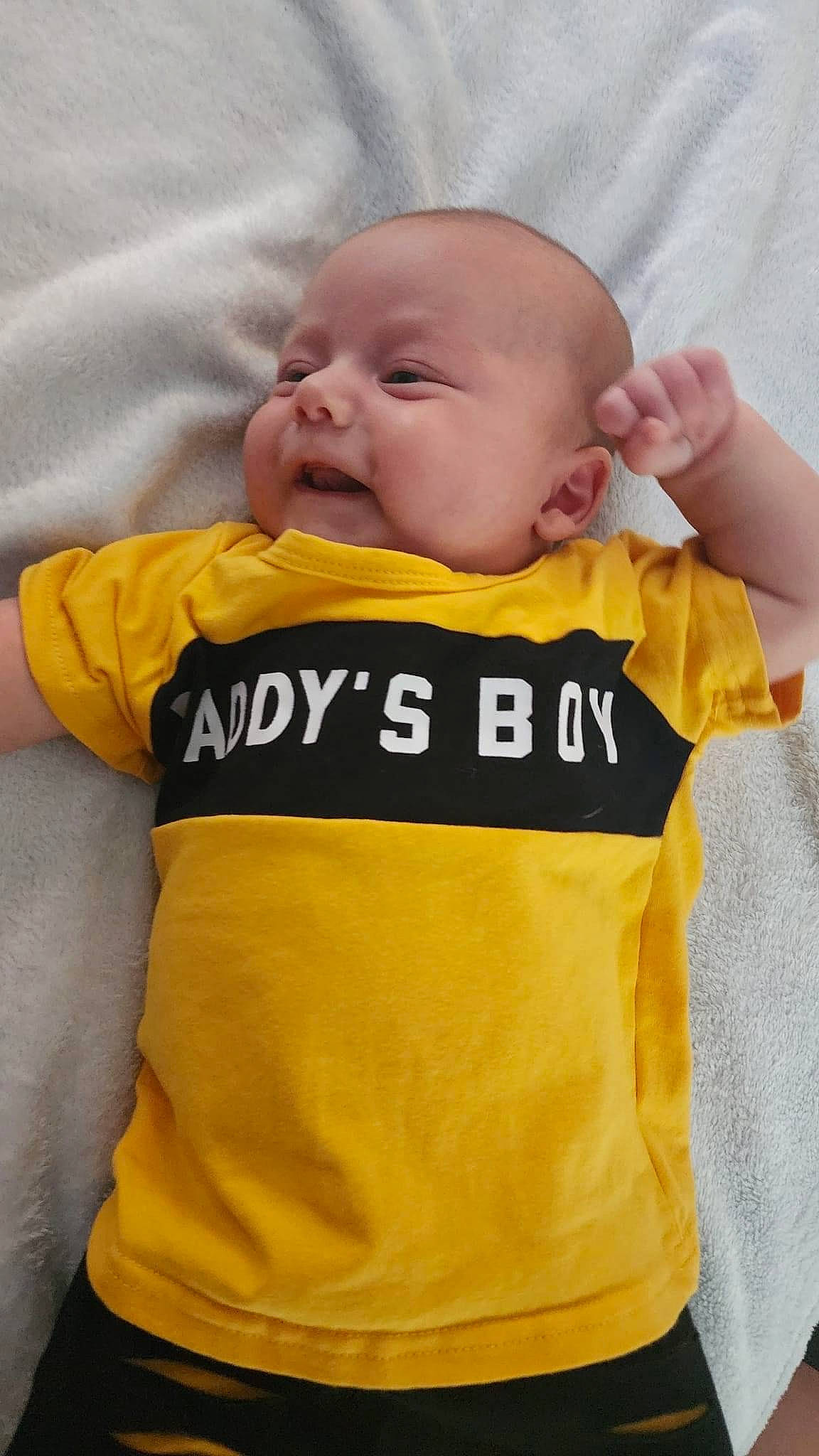 Kashton joined the competition — help win amazing prizes! baby_toddler_clothing, cheek, chin, comfort, eye, face, gesture, hair, head, human_body, mouth, neck, nose, orange, outerwear, person, skin, sleeve, smile, t_shirt