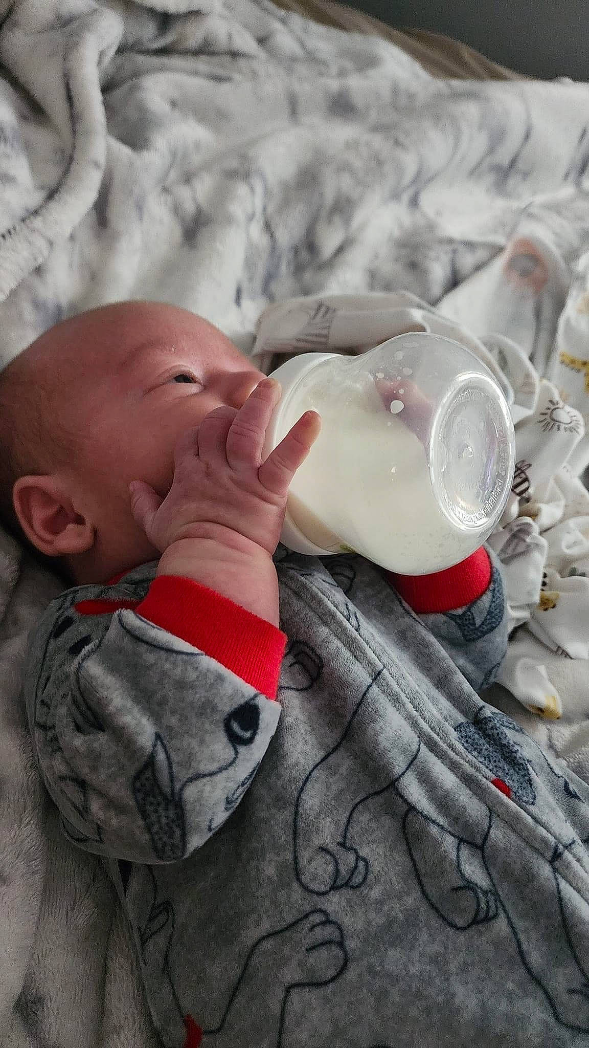 Kashton joined the competition — help win amazing prizes! baby, baby_toddler_clothing, carmine, cheek, child, close_up, comfort, drinking, drinkware, eyelash, happy, lip, mouth, nose, person, plastic_bottle, skin, stock_photography, textile, toddler