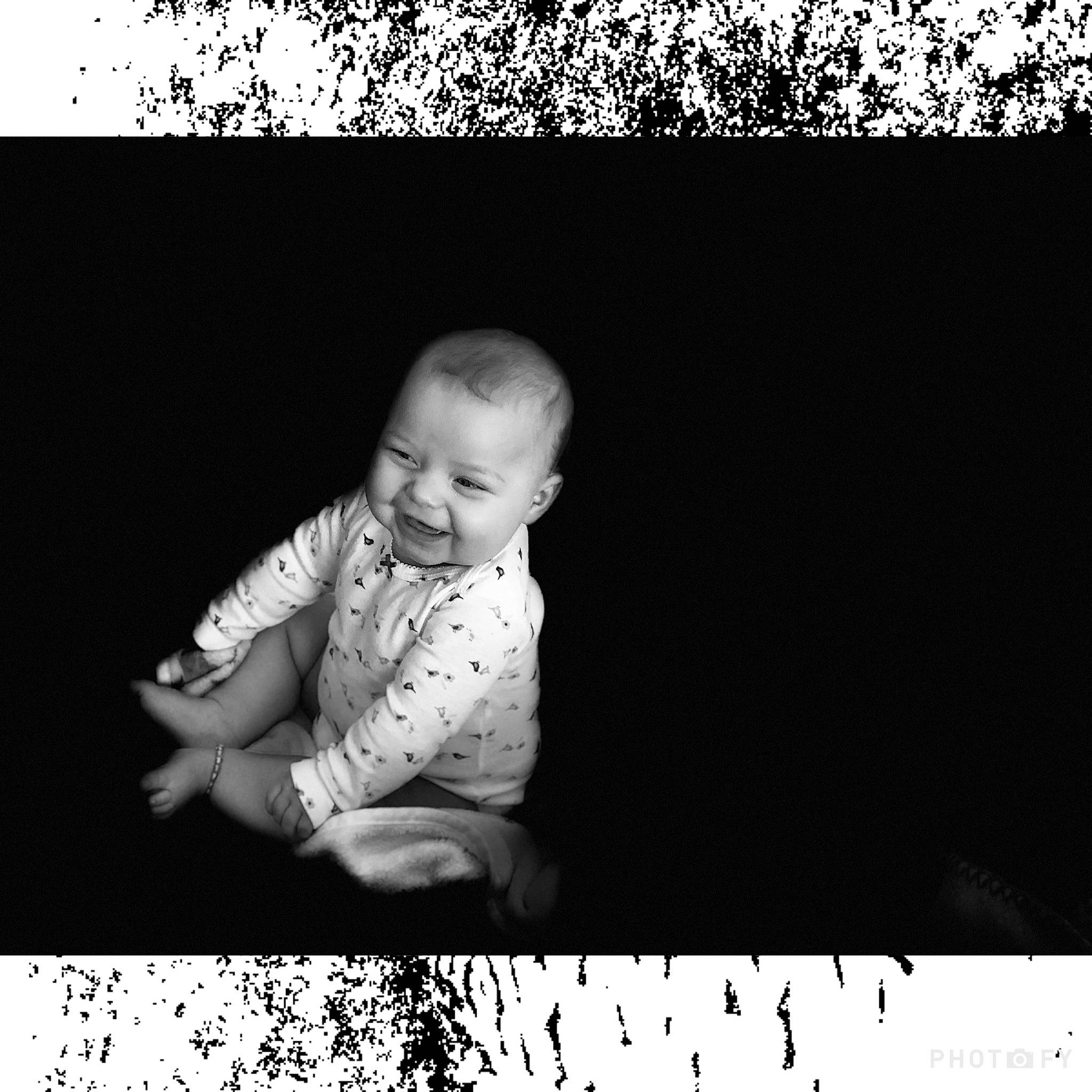 Kaelyn joined the competition — help win amazing prizes! adaptation, arm, art, baby, baby_toddler_clothing, black_and_white, darkness, flash_photography, font, happy, human, monochrome, monochrome_photography, person, photo_caption, picture_frame, rectangle, sleeve, smile, t_shirt