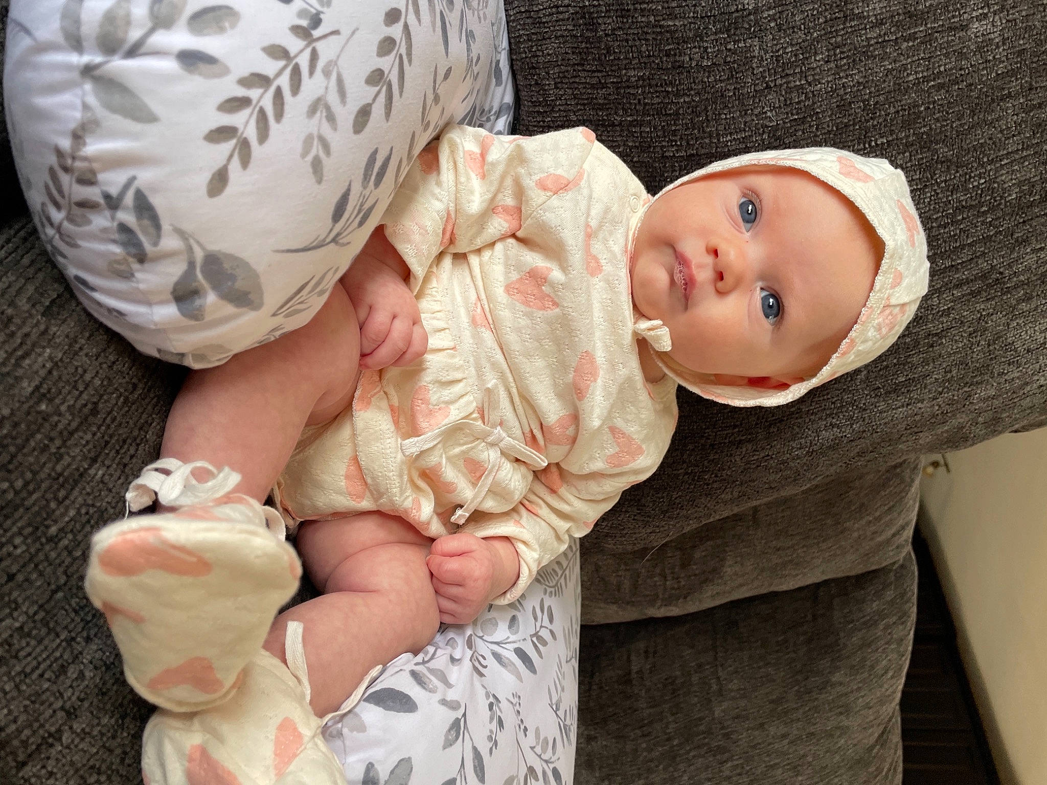 Sophia is registered to the contest to win money with this photo: baby, baby_sleeping, baby_toddler_clothing, cheek, comfort, eye, finger, gesture, hand, hat, headwear, human_body, linens, mouth, nose, people, person, pink, product, skin