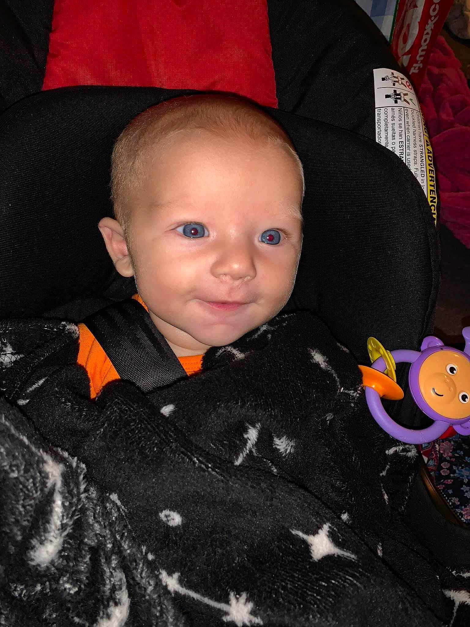 Johnny joined the competition — help win amazing prizes! baby, baby_products, baby_toddler_clothing, car_seat, carmine, cheek, child, collar, comfort, fun, headgear, pattern, person, personal_protective_equipment, sitting, skin, sleeve, smile, textile, toddler