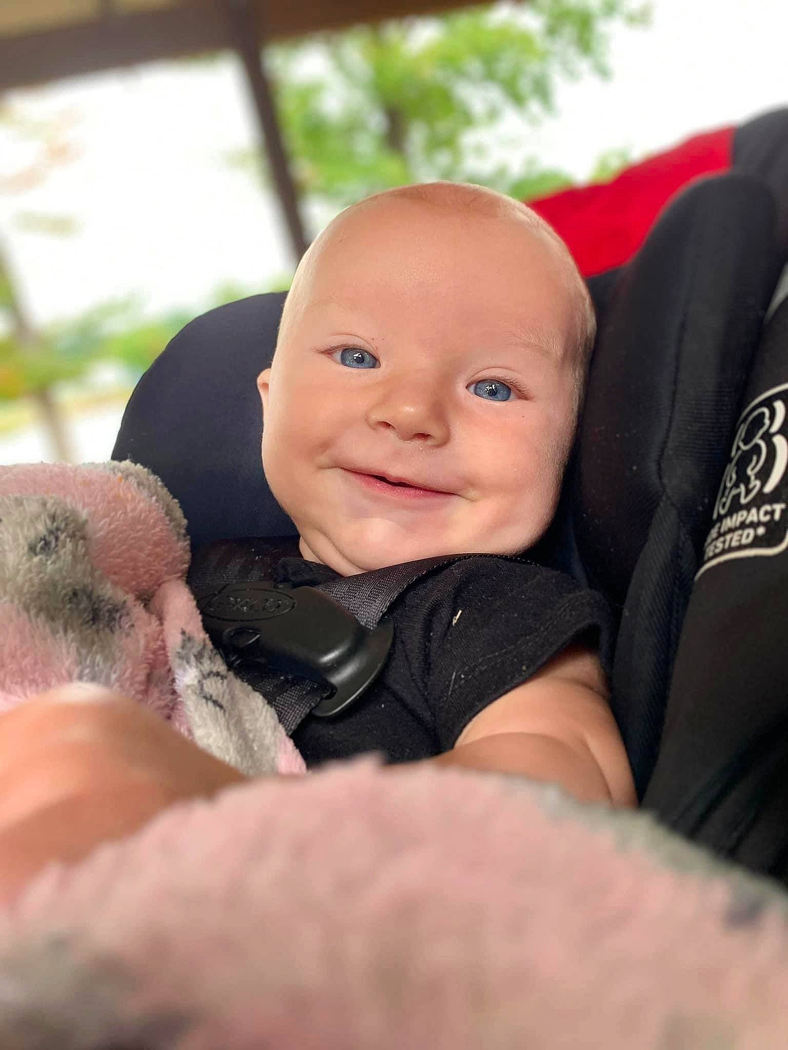 Johnny is registered to the contest to win money with this photo: baby, baby_toddler_clothing, cheek, comfort, finger, flash_photography, fun, gesture, grass, hairstyle, happy, joy, nail, nose, person, product, sitting, skin, smile, thumb