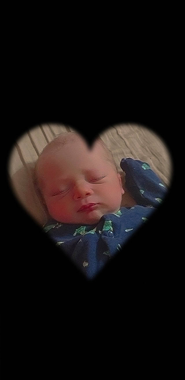 Allen is registered to the contest to win money with this photo: art, baby, baby_products, baby_toddler_clothing, circle, darkness, eyelash, fashion_accessory, flash_photography, fun, gesture, happy, iris, love, pattern, person, portrait, portrait_photography, room, sitting