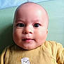 Tiam participe au concours pour gagner de l'argent avec cette photo : baby, clothing, face, frown, happy, head, newborn, person, photography, portrait, sad, selfie, skin, sleeve, smile, toy