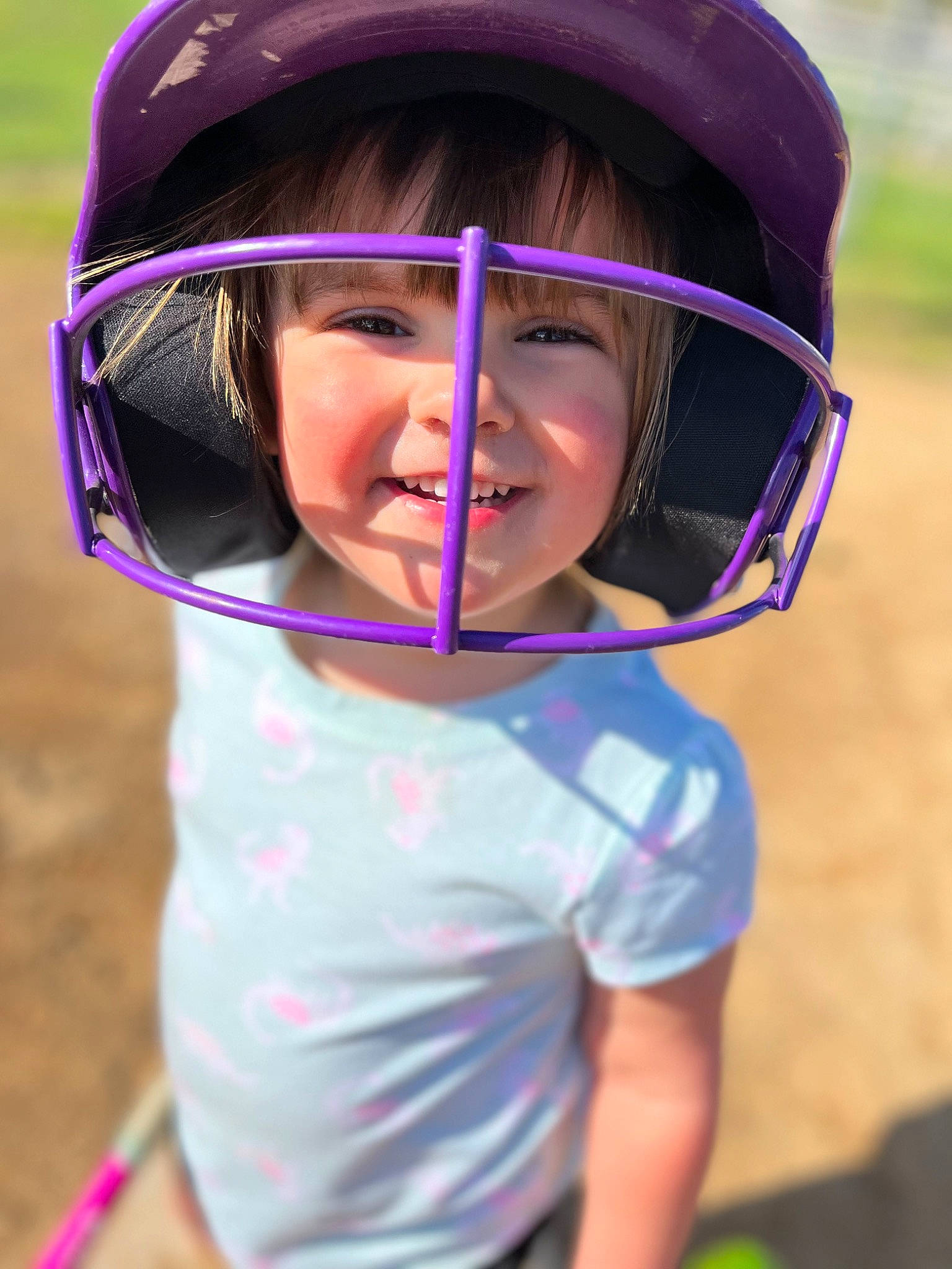 Juliette is registered to the contest to win money with this photo: bicycle_clothing, bicycle_helmet, bicycles_equipment_and_supplies, equestrian_helmet, eyewear, face, fun, happy, headgear, helmet, leisure, motorcycle_helmet, person, personal_protective_equipment, pink, purple, recreation, smile, sports_equipment, sports_gear