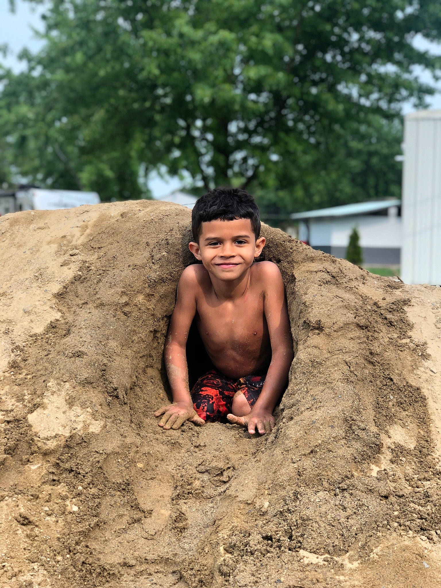Roman joined the competition — help win amazing prizes! barechested, concrete, face, fun, grass, happy, joy, landscape, leisure, mud, people_in_nature, person, play, sand, sitting, sky, smile, soil, toddler, tree