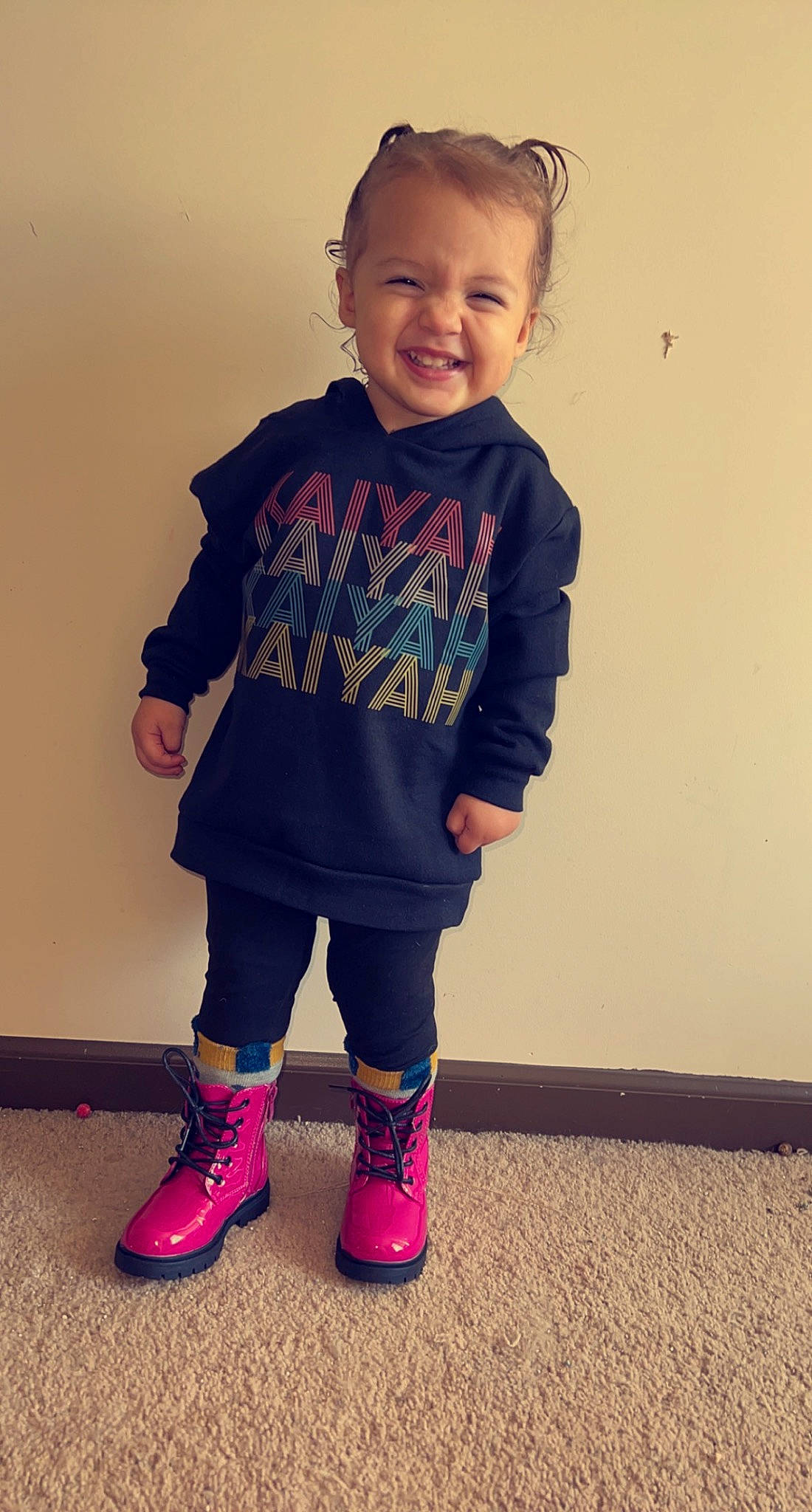 Kaiyah is registered to the contest to win money with this photo: baby_toddler_clothing, child, clothing, electric_blue, face, fashion_design, flooring, happy, joy, knee, magenta, neck, pattern, person, pink, purple, sleeve, smile, sportswear, standing