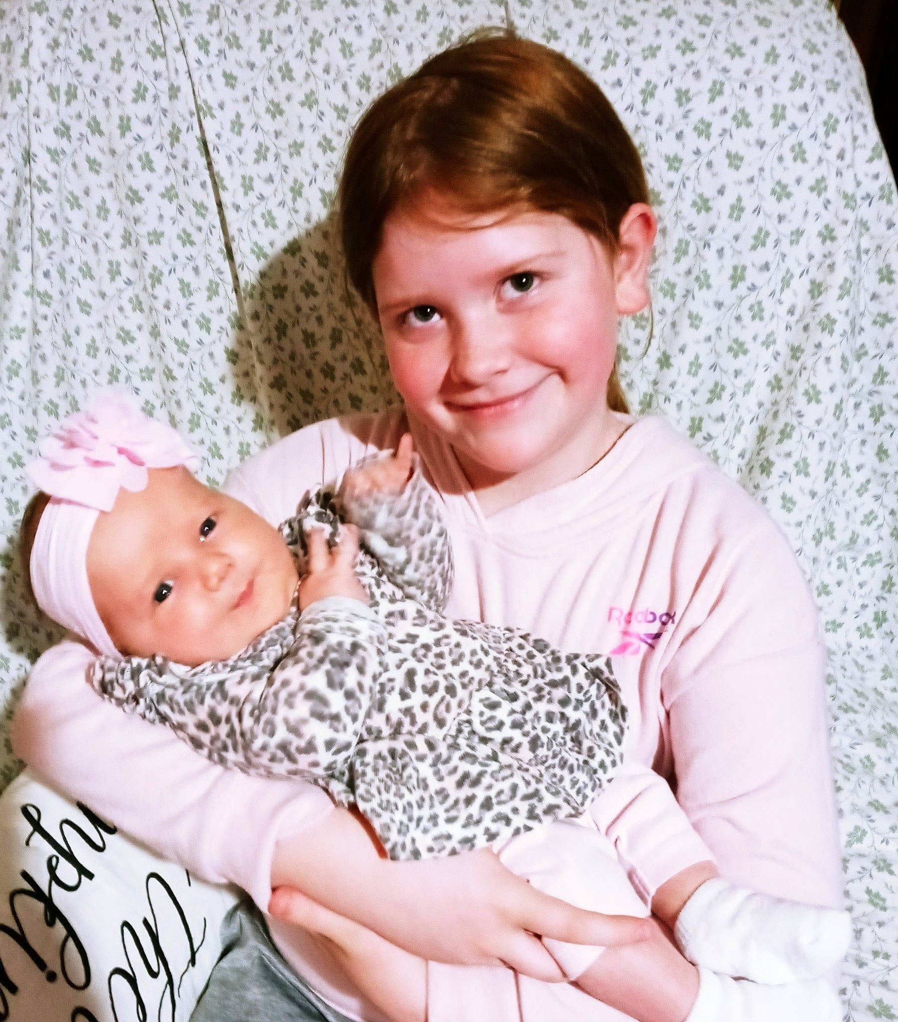 Malaiah is registered to the contest to win money with this photo: baby, baby_sleeping, baby_toddler_clothing, beauty, cheek, child, comfort, happy, headwear, joy, linens, mammal, pattern, people, person, pink, sitting, skin, sleeve, smile