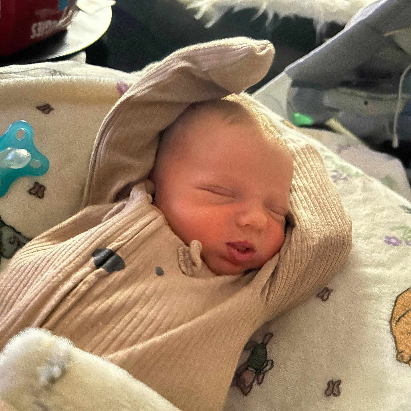 Lehman is registered to the contest to win money with this photo: animal_print, baby, bed, blanket, child, clothing, cozy, cute, face, indoor, infant, newborn, pacifier, peaceful, portrait, rest, sleeping, soft, toddler, young