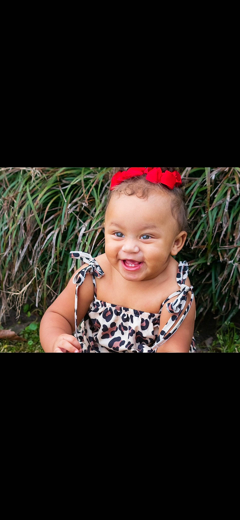 Alonni Kalise is registered to the contest to win money with this photo: baby, baby_toddler_clothing, cheek, child, flash_photography, fun, grass, happy, iris, jewellery, joy, laugh, pattern, person, plant, portrait, portrait_photography, sitting, sleeve, smile