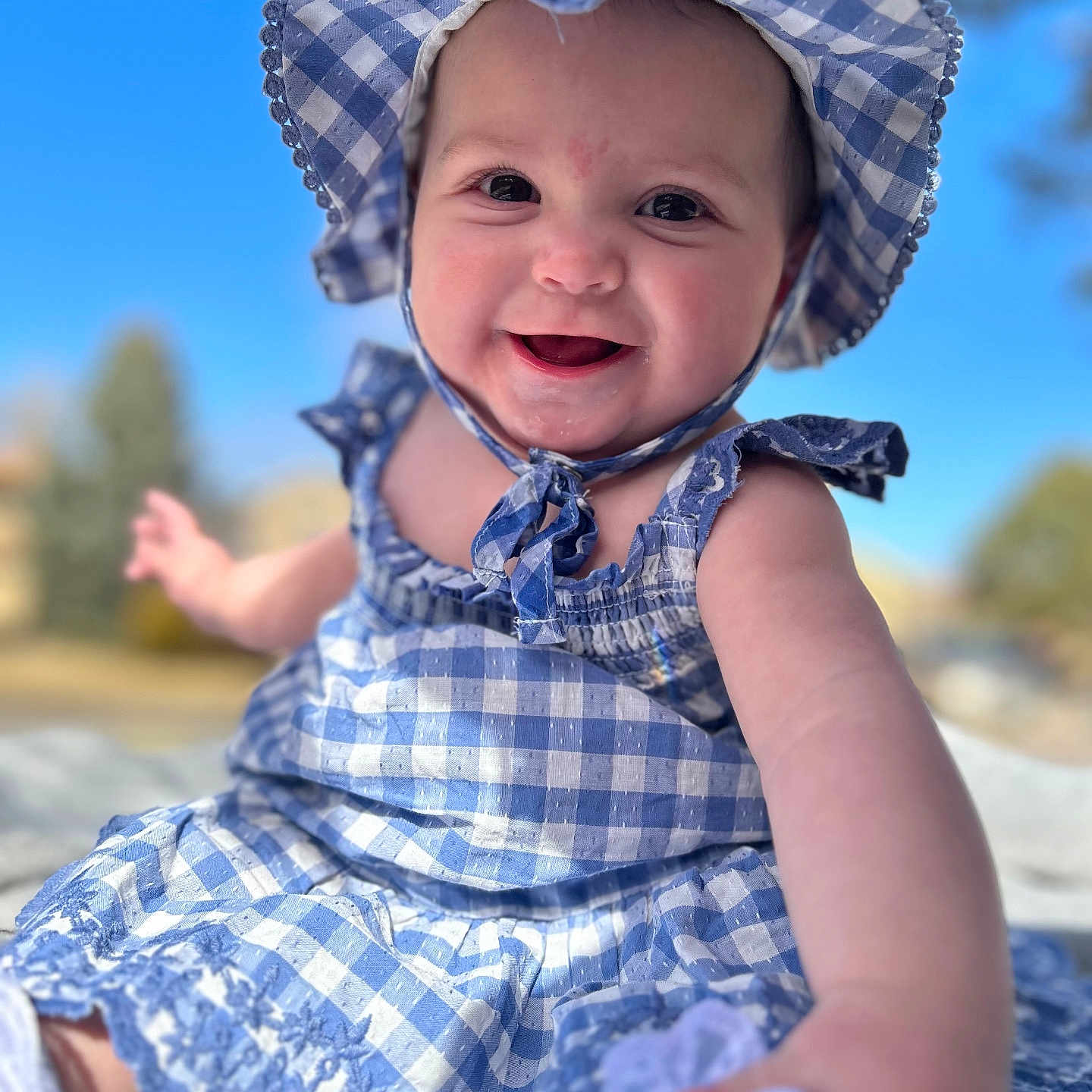 Ivee joined the competition — help win amazing prizes! baby, babylaughing, bonnet, cap, clothing, costume, dress, face, happy, hat, head, laughing, pants, person, photography, portrait, sitting, smile, sunhat