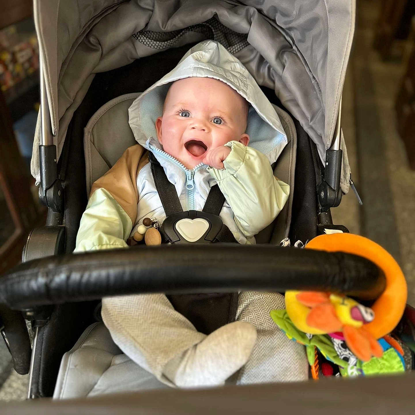 Myles is registered to the contest to win money with this photo: baby, babylaughing, clothing, crib, face, furniture, happy, hat, head, infantbed, person, photography, portrait, shopping, smile, stroller, yawning