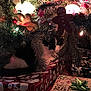 animal, black_and_white_cat, candy, cat, celebration, christmas, christmas_lights, christmas_tree, decoration, festive, festivity, gift_box, gingerbread, holiday, holiday_season, indoor, no_people, ornament, pine_branches, wrapped_presents