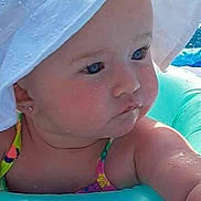 Averie joined the competition — help win amazing prizes! baby, bonnet, cap, clothing, face, hat, head, leisureactivities, person, photography, pool, portrait, sport, summer, sunhat, swimming, swimmingpool, swimwear, water, watersports