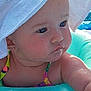 baby, bonnet, cap, clothing, face, hat, head, leisureactivities, person, photography, pool, portrait, sport, summer, sunhat, swimming, swimmingpool, swimwear, water, watersports
