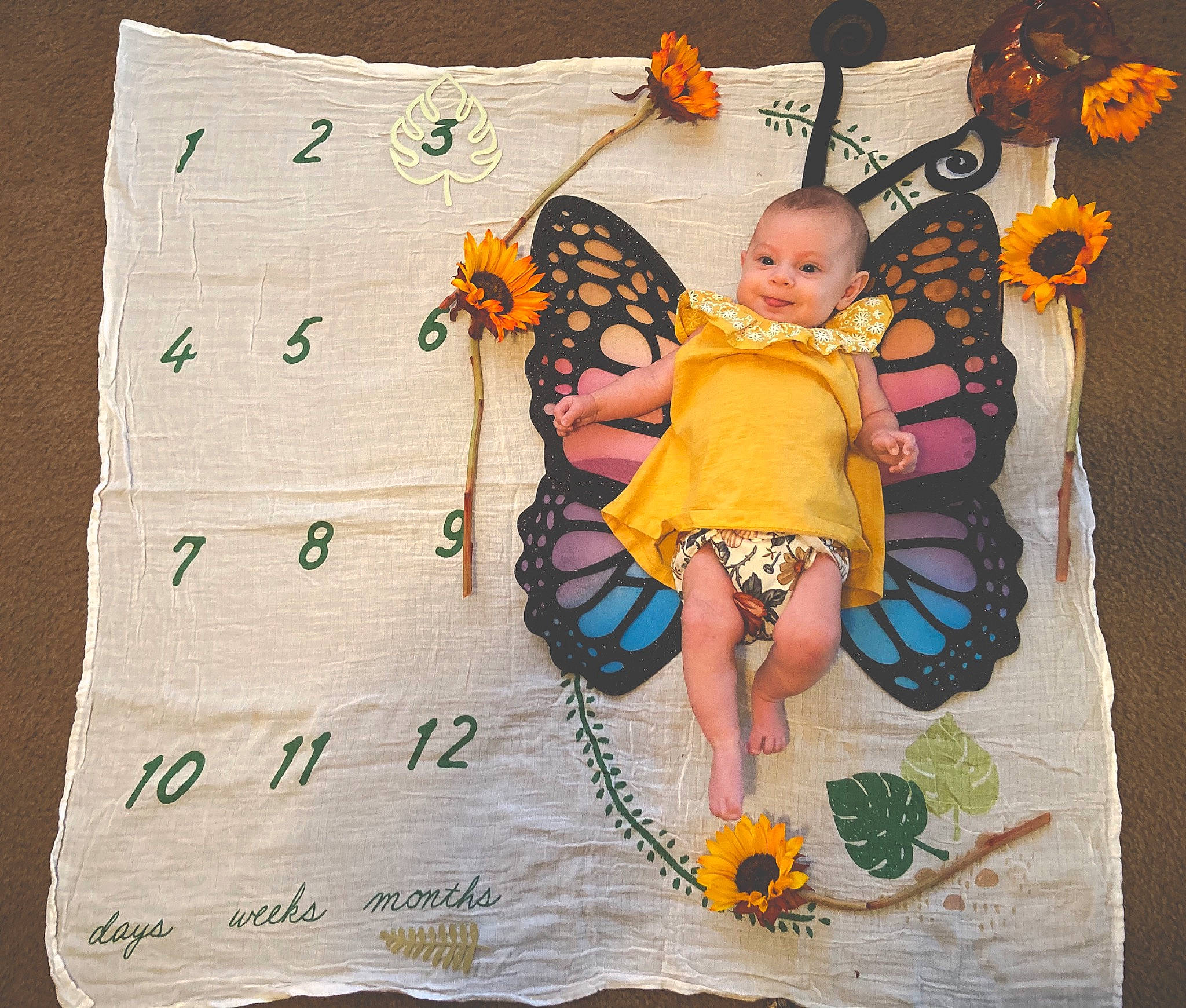 Elowyn is registered to the contest to win money with this photo: baby_toddler_clothing, child, joy, pattern, person, textile, toddler, yellow