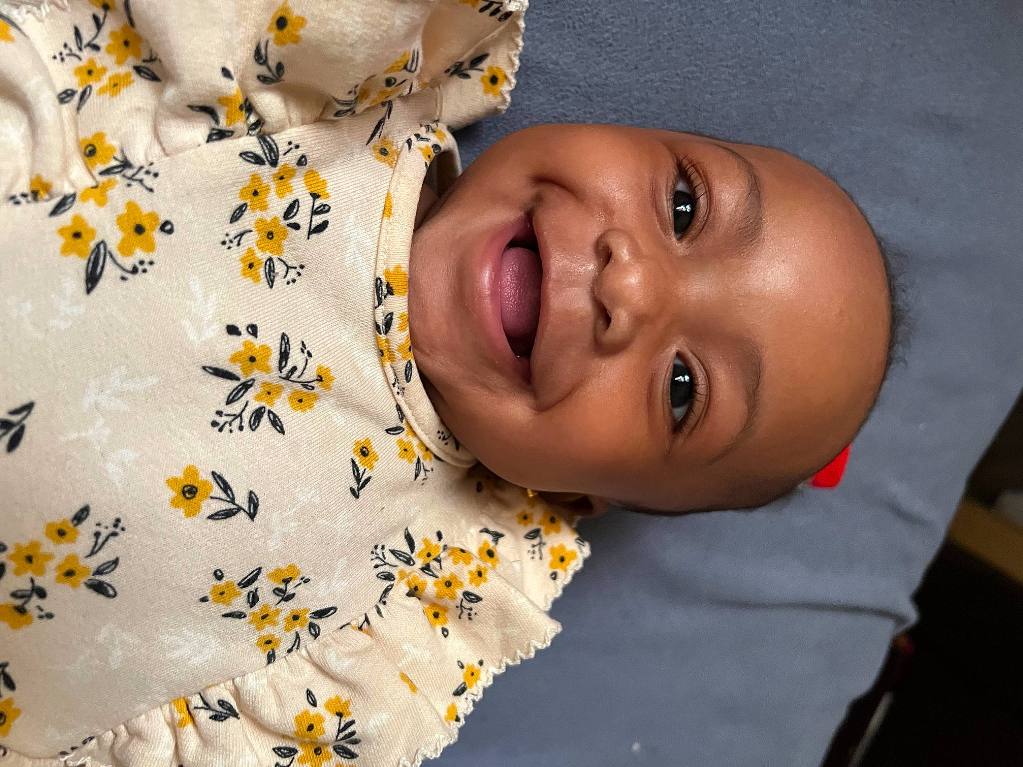 Adilynn is registered to the contest to win money with this photo: baby, baby_laughing, baby_toddler_clothing, cheek, child, fun, happy, hat, joy, laugh, linens, lip, nose, pattern, person, petal, portrait_photography, skin, smile, toddler