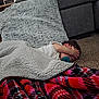 Hakeem joined the competition — help win amazing prizes! child, blanket, carpet, pacifier, indoor, couch, living_room, nap, sleeping, cozy, furniture, comfort, toddler, resting, curly_hair, home, soft_texture, relaxation, casual, person
