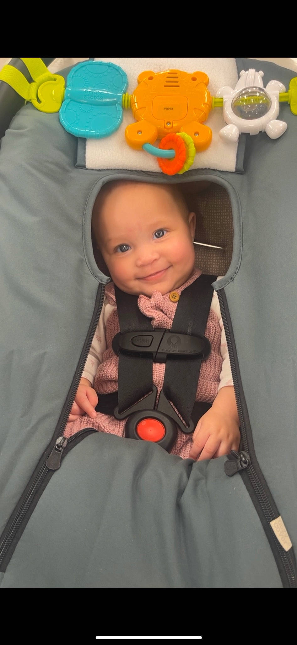 Zayla is registered to the contest to win money with this photo: baby, baby_carriage, baby_products, baby_safety, baby_toddler_clothing, bag, car_seat, cheek, child, comfort, fun, infant_bed, joy, orange, person, product, room, sitting, smile, stuffed_toy