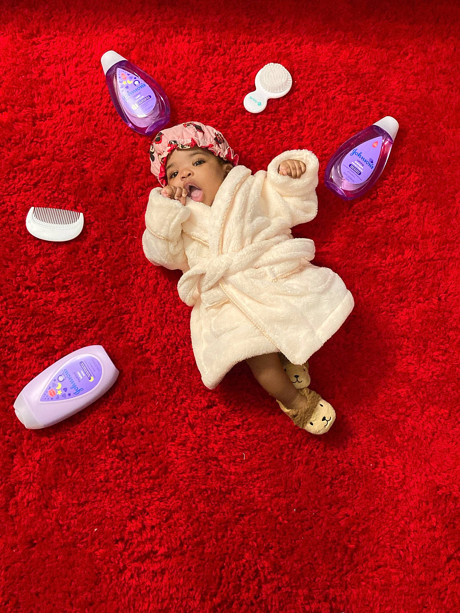 Kilani joined the competition — help win amazing prizes! baby_toddler_clothing, carmine, costume_hat, event, fashion_accessory, finger, flooring, font, foot, gesture, happy, headwear, holiday, magenta, ornament, person, petal, pink, pollinator, shoe