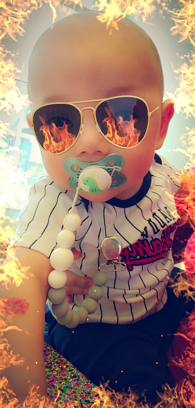 Bentlee joined the competition — help win amazing prizes! art, cool, eyewear, finger, fun, gesture, glasses, goggles, happy, jaw, light, lip, mouth, orange, person, personal_protective_equipment, recreation, sunglasses, t_shirt, toddler