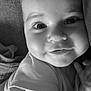 Lexie participe au concours pour gagner de l'argent avec cette photo : baby, close_up, face, infant, black_and_white, cute, smile, eyes, skin, child, young, portrait, expression, soft, cuddle, clothing, hand, adorable, indoors, person