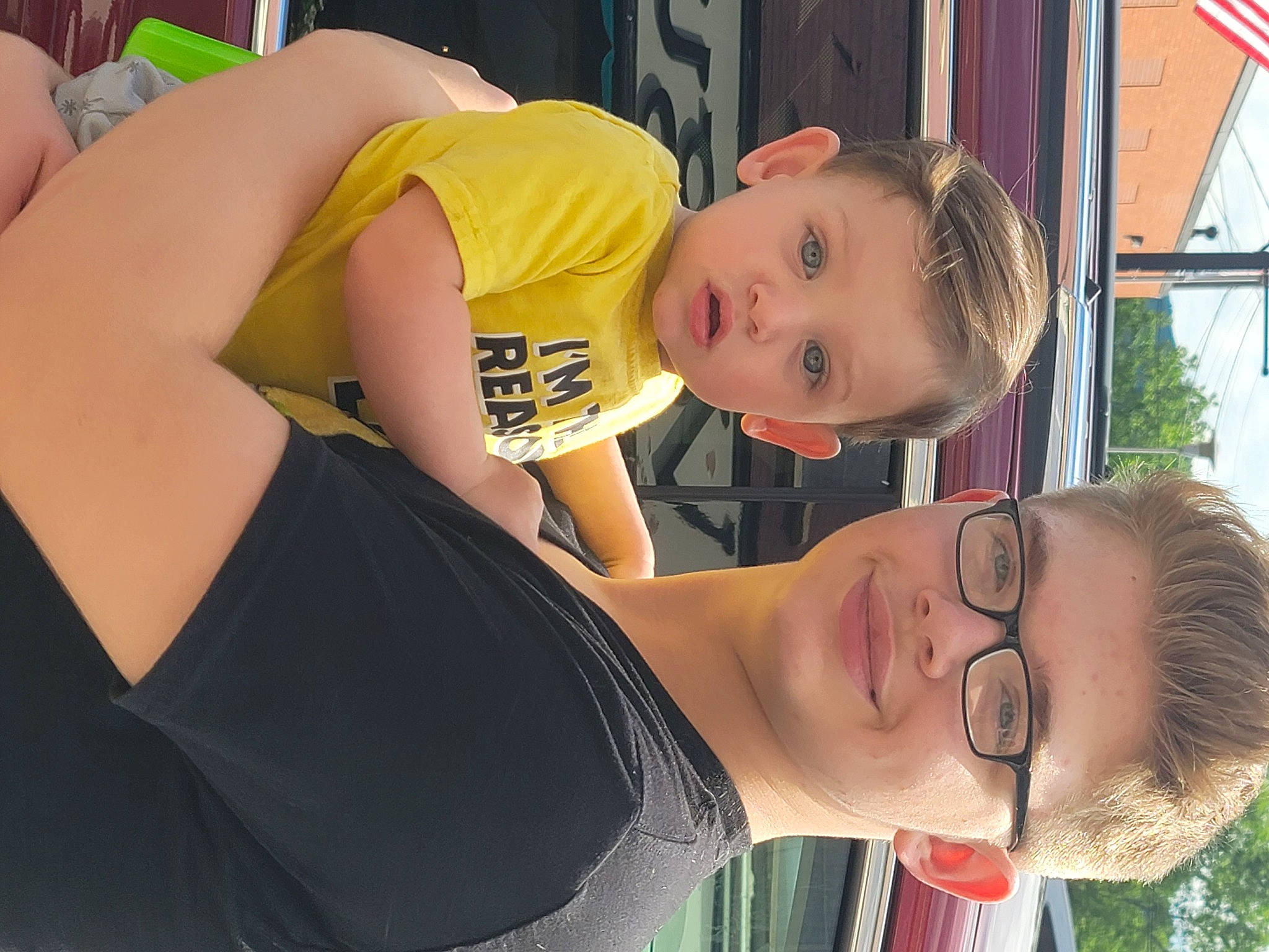 Elliott is registered to the contest to win money with this photo: cool, eyewear, face, facial_expression, glasses, grass, happy, joint, joy, leisure, mouth, neck, nose, person, plant, shoulder, smile, t_shirt, tree, vertebrate