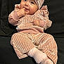 Valenciannah joined the competition — help win amazing prizes! baby, infant, child, pink_outfit, velvet_clothing, headband, sitting, finger_in_mouth, cute, adorable, portrait, soft_texture, cozy, indoor, young_child, smiling, happy, person, closeup, face