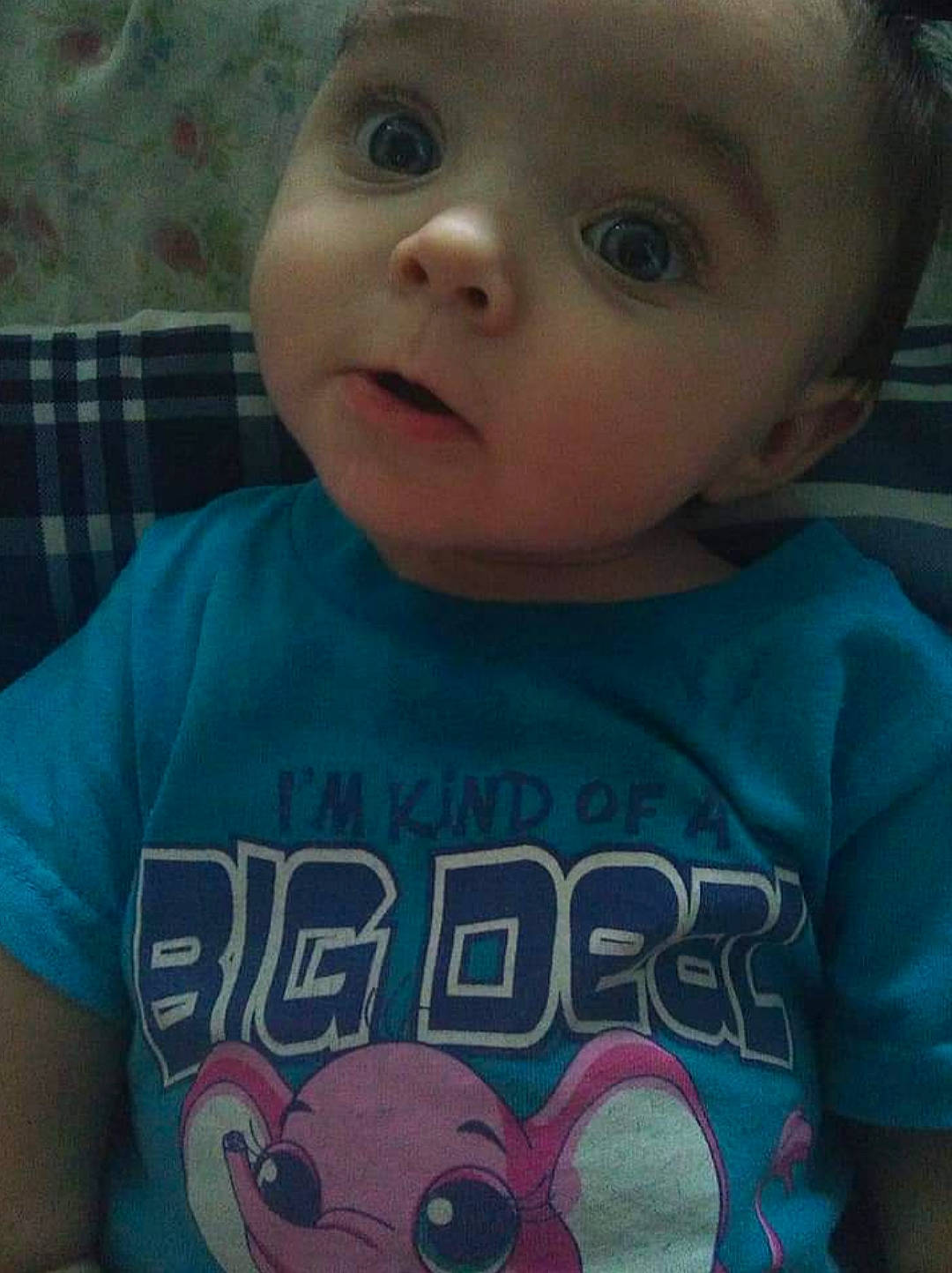 Margot is registered to the contest to win money with this photo: baby, baby_toddler_clothing, cheek, cool, eyelash, forehead, happy, iris, jaw, lip, mammal, mouth, neck, nose, organ, person, pink, sleeve, t_shirt, vertebrate