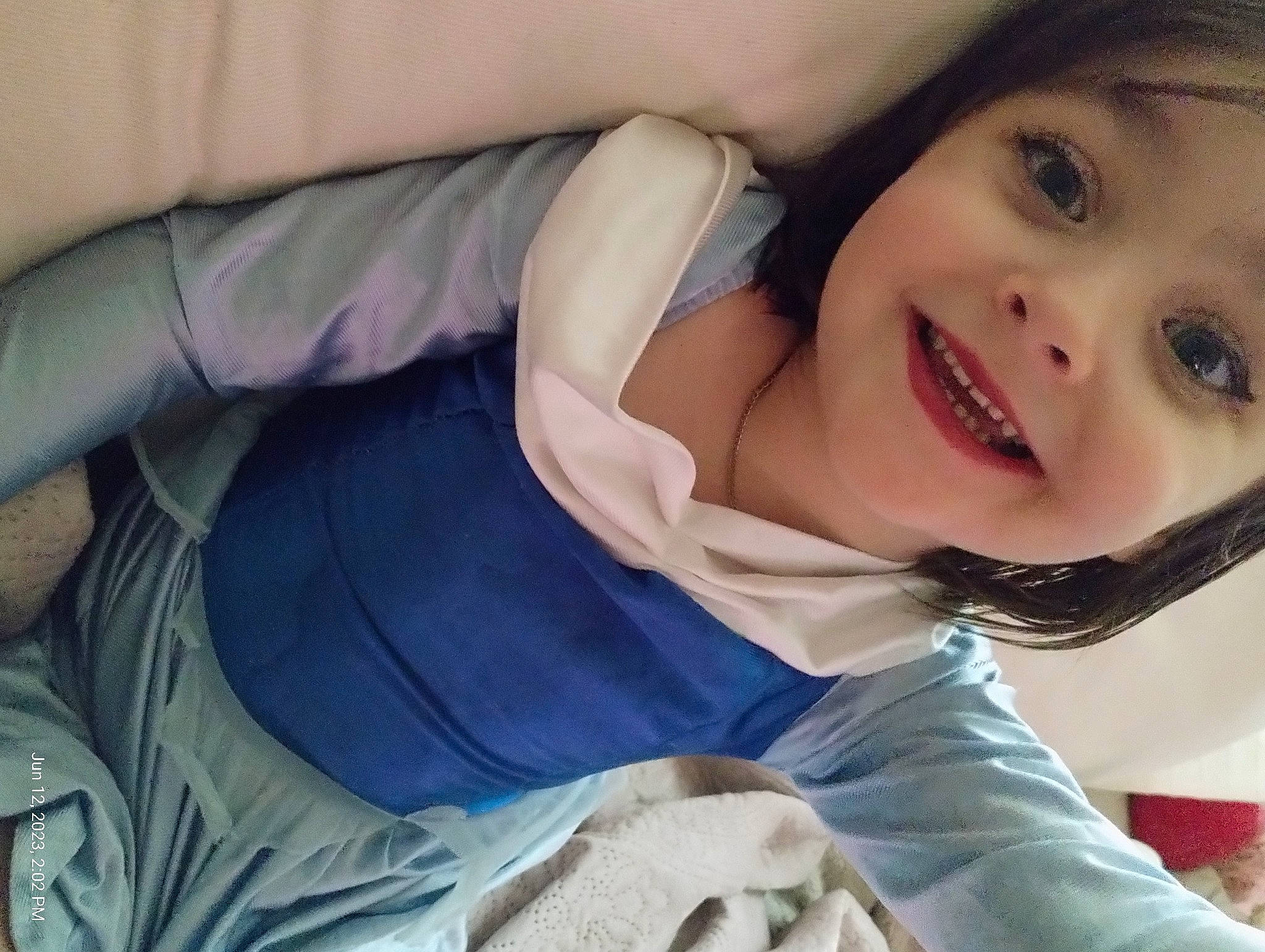 Margot is registered to the contest to win money with this photo: auto_part, baby, baby_products, car_seat, child, comfort, electric_blue, eye, eyelash, gesture, happy, head, jaw, joy, lip, mouth, nose, person, sitting, smile