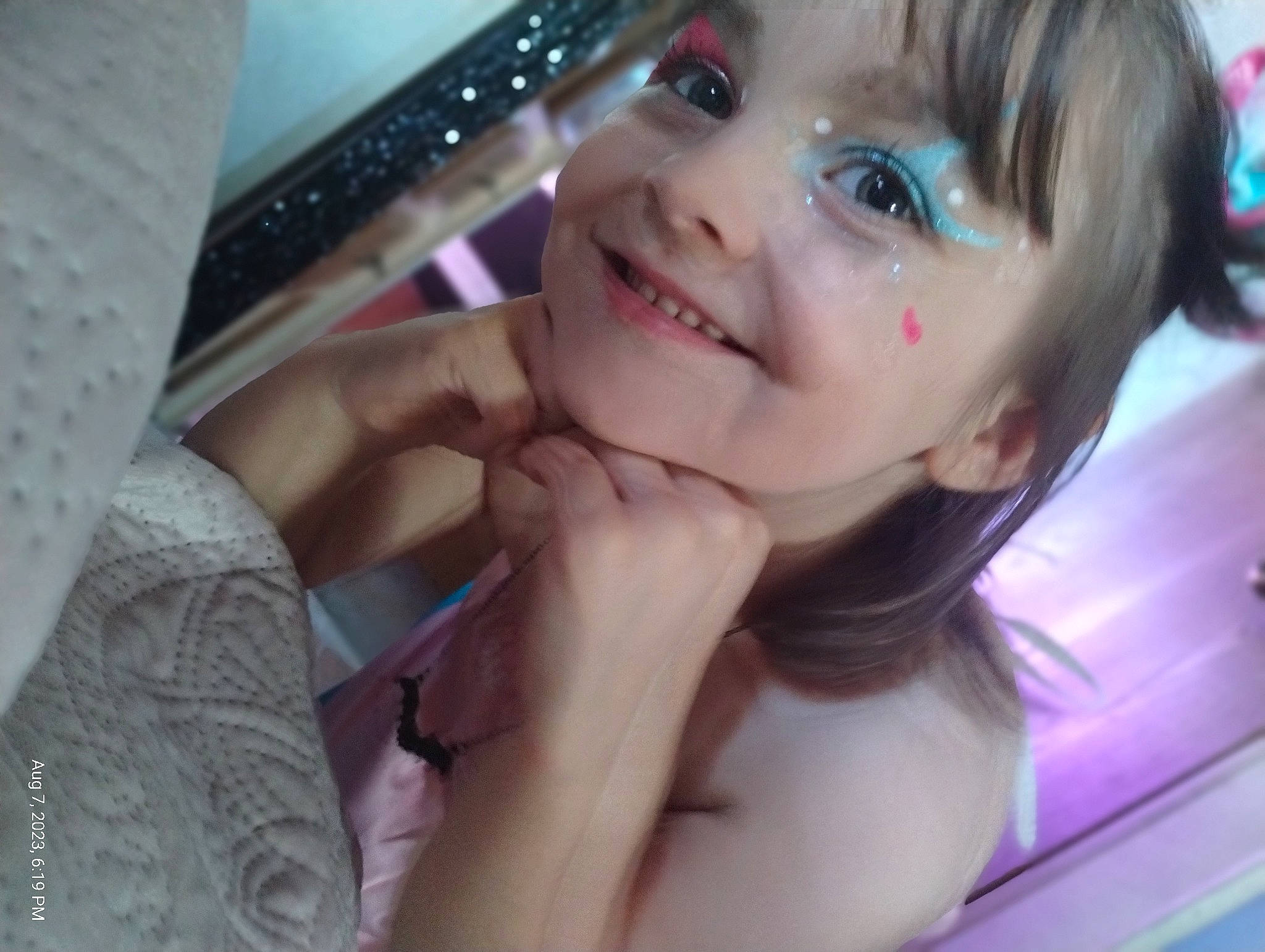 Margot is registered to the contest to win money with this photo: black_hair, cheek, chin, ear, eye, eyebrow, eyelash, finger, flash_photography, fun, gesture, happy, iris, jaw, joy, lip, mouth, neck, nose, person