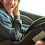 adult, baby, car_seat, car_interior, child, seatbelt, long_hair, sunglasses, casual, candid, daylight, person, smiling, happy, clothing, car_window, infant, seat, safety, portrait