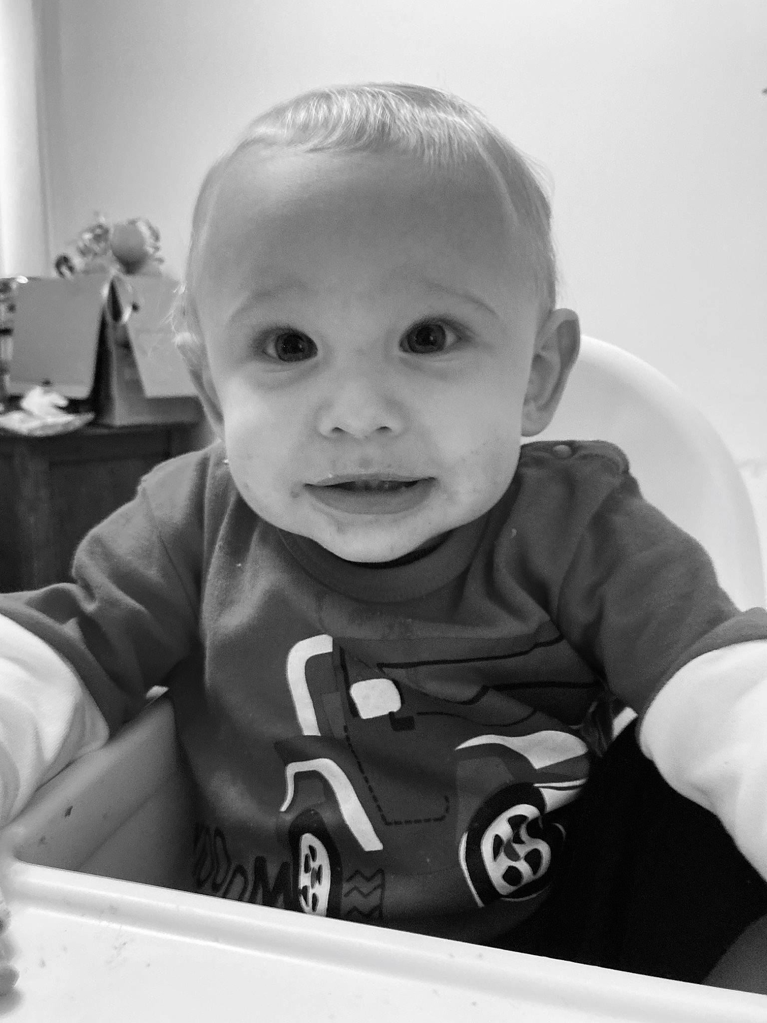 Lucas joined the competition — help win amazing prizes! baby, black, black_and_white, cheek, child, eye, face, facial_expression, head, monochrome, monochrome_photography, person, photography, portrait_photography, product, room, sitting, skin, smile, toddler